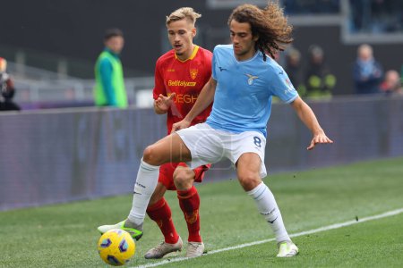 Photo for Rome, Italy 14.01.2024:  Matteo Guendouzi of Lazio, Askildsen of Lecce in action during  the Italian Serie A TIM 2023-2024 football match SS Lazio vs US Lecce at Olympic Stadium in Rome. - Royalty Free Image