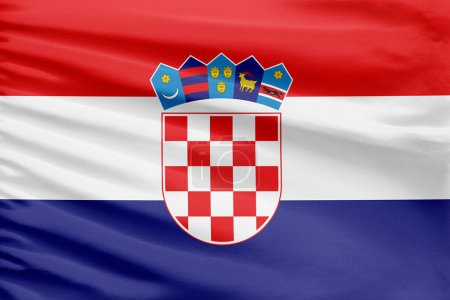 Téléchargez les photos : Le drapeau de Croatie est représenté sur un tissu de tissu de point de sport avec des plis. - en image libre de droit