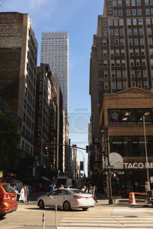 Photo for NEW YORK, USA - OCTOBER 11, 2022: People and transport on street in Manhattan - Royalty Free Image