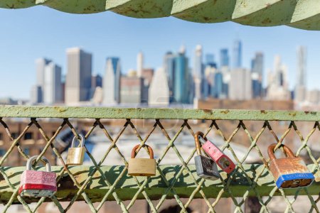 Photo for Brooklyn Queens, New York City, USA - February 11, 2023: love padlock hanging on a fence in front of manhattan on a winter day - Royalty Free Image