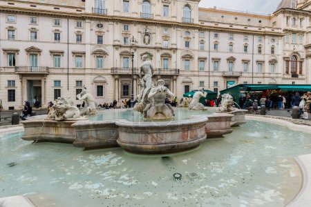 Photo for Rome, Italy - December 29, 2023: view of Navona Square and its fountains visited by tourists in the historic city center on a winter day - Royalty Free Image