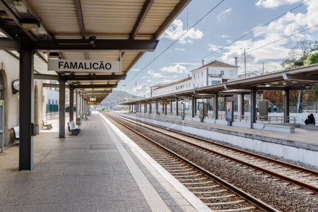 Photo for Vila Nova de Famalicao, Braga, Portugal - October 22, 2020: exterior architectural detail and its platforms of the Famalicao railway station on an autumn day - Royalty Free Image