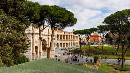 Photo for Rome, Italy - December 27, 2023: view of the Coliseum of Rome visited by tourists in the historic city center on a winter day - Royalty Free Image