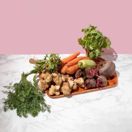 Organic fresh vegetables on a tray in the kitchen. Healthy raw food concept