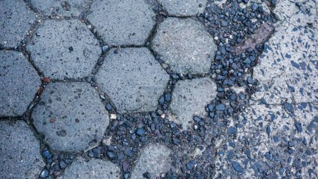hexagonal paving stones and pebbles for an abstract background