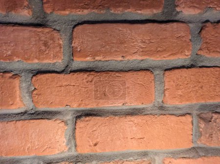 Photo for Brick patterns on and old living room wall in Czech republic after renovation,red and brown like bricks,industrial pattern,modern architecture interior trend - Royalty Free Image