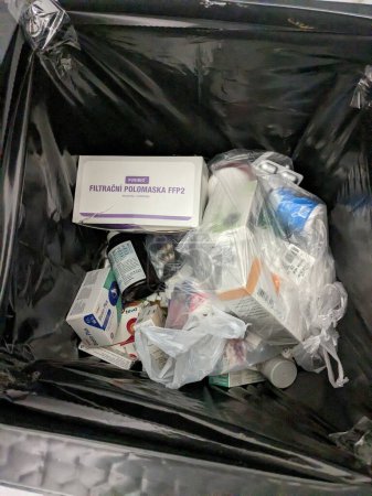Photo for Prague,Czech republic  May 23 2023 : Wasting with drugs sometimes unopened packs are thrown away to Pharmacy special garbage bin.Unused medicine cost huge amount of money from Health care systems - Royalty Free Image