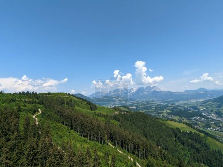 Photo for Kirchdorf in Tirol - Kirchdorf,Unterberghorn panorama landscape view from the hills above Kossen town in Austrian Alps - Royalty Free Image
