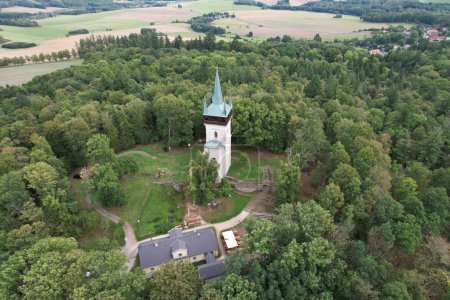 aerial view of The Bolfanek viewtower with the St. Wolfgangs cemetery chapel. Near a marvelous village Chudenice from 12th century.Czech landmarks from above. Golden autumn in Central Europe,lookout