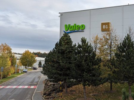 Photo for Humpolec, Czech republic - November 11, 2023: Valeo logo sign. French global automotive supplier, building with brand logotype signboard.Czech factory warehouse and production plant by D1 highway - Royalty Free Image