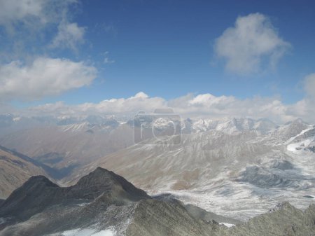 Photo for Aerial panorama landscape view of Himalayas mountains as seen from a paragliding flight from Dharamsala to Manali, Bir Billing.Majestic mountain range with snowy peaks in the India-Himachal Pradesh - Royalty Free Image