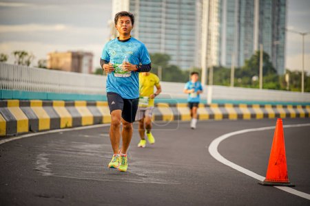 Photo for People running in a marathon event called Superball 2022 in South Jakarta, Indonesia - Royalty Free Image