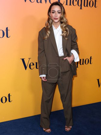 Photo for American actress and singer Chloe Bennet arrives at the Veuve Clicquot 250th Anniversary Solaire Culture Exhibition Opening held at 468 North Rodeo Drive on October 25, 2022 in Beverly Hills, Los Angeles, California, United States. - Royalty Free Image