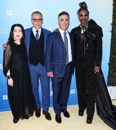 Photo for Executive Vice President of Universal Music Group Michele Anthony, Co-Founder, Chairman and CEO of Republic Records Monte Lipman, Co-Founder and President of Republic Records Avery Lipman and American actor Billy Porter arrive at the City Of Hope - Royalty Free Image