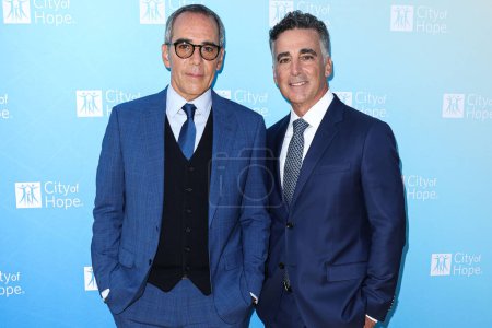 Photo for Co-Founder, Chairman and CEO of Republic Records Monte Lipman and brother/Co-Founder, President and COO of Republic Records Avery Lipman arrive at the City Of Hope's 2022 Spirit Of Life Gala held at the Pacific Design Center on October 27, 2022 - Royalty Free Image
