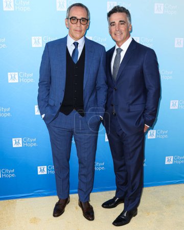 Photo for Co-Founder, Chairman and CEO of Republic Records Monte Lipman and brother/Co-Founder, President and COO of Republic Records Avery Lipman arrive at the City Of Hope's 2022 Spirit Of Life Gala held at the Pacific Design Center on October 27, 2022 - Royalty Free Image