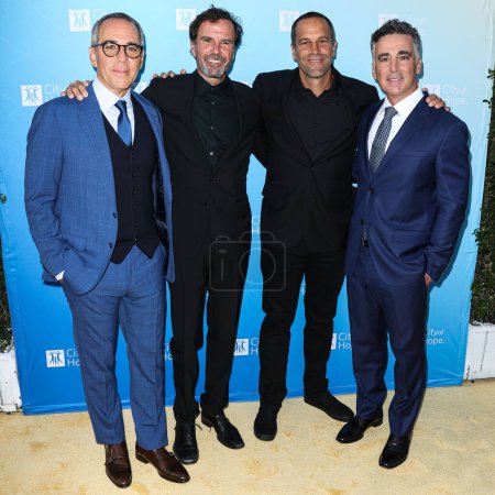 Photo for Co-Founder, Chairman and CEO of Republic Records Monte Lipman, American music video and film director Emmett Malloy, American singer-songwriter Jack Johnson and Co-Founder, President and COO of Republic Records Avery Lipman arrive at the City Of Hope - Royalty Free Image