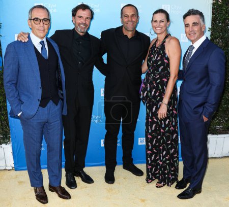 Photo for Co-Founder, Chairman and CEO of Republic Records Monte Lipman, American music video and film director Emmett Malloy, American singer-songwriter Jack Johnson, Kim Johnson and Co-Founder, President and COO of Republic Records Avery Lipman - Royalty Free Image