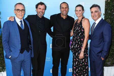 Photo for Co-Founder, Chairman and CEO of Republic Records Monte Lipman, American music video and film director Emmett Malloy, American singer-songwriter Jack Johnson, Kim Johnson and Co-Founder, President and COO of Republic Records Avery Lipman - Royalty Free Image