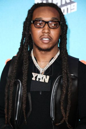 Photo for Migos Rapper Takeoff Dead At 28. American rapper Takeoff (Kirshnik Khari Ball) of hip hop trio Migos arrives at Nickelodeon's 2019 Kids' Choice Awards held at the USC Galen Center on March 23, 2019 in Los Angeles, California, United States. - Royalty Free Image