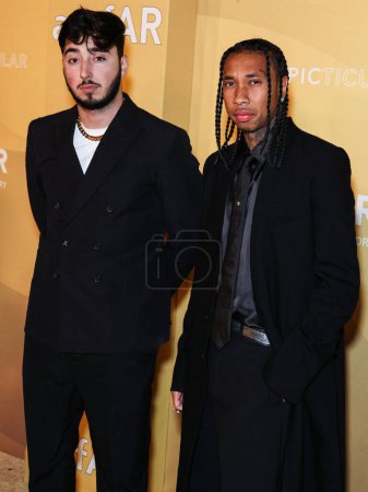 Photo for Zack Bia and Tyga arrive at the 2022 amfAR Gala Los Angeles held at the Pacific Design Center on November 3, 2022 in West Hollywood, Los Angeles, California, United States. - Royalty Free Image