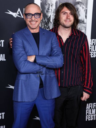 Photo for American actor Robert Downey Jr. and son Indio Falconer Downey arrive at the 2022 AFI Fest - Special Screening Of Netflix's 'Sr.' held at the TCL Chinese Theatre IMAX on November 4, 2022 in Hollywood, Los Angeles, California, United States. - Royalty Free Image