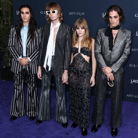 Photo for Ethan Torchio, Thomas Raggi, Victoria De Angelis and Damiano David of Mneskin arrive at the 11th Annual LACMA Art + Film Gala 2022 presented by Gucci held at the Los Angeles County Museum of Art on November 5, 2022 in Los Angeles, California, USA. - Royalty Free Image