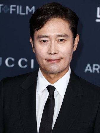 Photo for Lee Byung-hun arrives at the 11th Annual LACMA Art + Film Gala 2022 presented by Gucci held at the Los Angeles County Museum of Art on November 5, 2022 in Los Angeles, California, United States. - Royalty Free Image