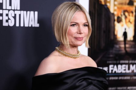 Photo for American actress Michelle Williams wearing Tiffany and Co. jewelry arrives at the 2022 AFI Fest - Closing Night Special Screening Of Universal Pictures' 'The Fabelmans' held at the TCL Chinese Theatre IMAX on November 6, 2022 in Hollywood, USA - Royalty Free Image