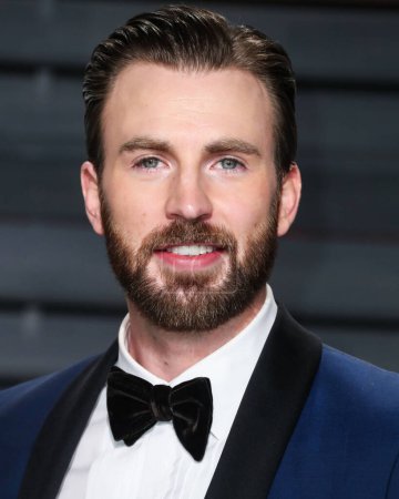 Photo for Chris Evans Named People's 2022 Sexiest Man Alive on November 7, 2022. Actor Chris Evans arrives at the 2017 Vanity Fair Oscar Party held at the Wallis Annenberg Center for the Performing Arts on February 26, 2017 in Beverly Hills, Los Angeles - Royalty Free Image