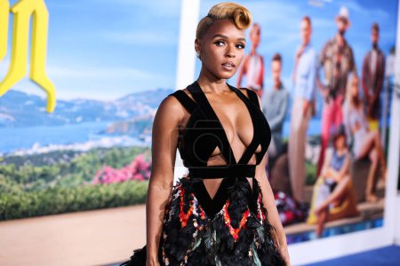 Photo for Janelle Mone (Janelle Monae) wearing an Elie Saab Haute Couture dress and a Rodo clutch arrives at the Los Angeles Premiere Of Netflix's 'Glass Onion: A Knives Out Mystery' held at the Academy Museum on November 14, 2022 - Royalty Free Image