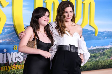 Photo for Mae Sandler and mother Kathryn Hahn arrive at the Los Angeles Premiere Of Netflix's 'Glass Onion: A Knives Out Mystery' held at the Academy Museum of Motion Pictures on November 14, 2022 in Los Angeles, California, United States. - Royalty Free Image