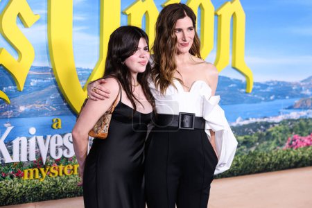 Photo for Mae Sandler and mother Kathryn Hahn arrive at the Los Angeles Premiere Of Netflix's 'Glass Onion: A Knives Out Mystery' held at the Academy Museum of Motion Pictures on November 14, 2022 in Los Angeles, California, United States. ( - Royalty Free Image