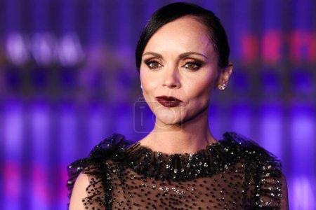 Photo for American actress Christina Ricci wearing Rodarte arrives at the World Premiere Of Netflix's 'Wednesday' Season 1 held at the Hollywood American Legion Post 43 at Hollywood Legion Theater on November 16, 2022 in Hollywood, Los Angeles, California - Royalty Free Image