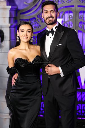 Photo for Viviana Sposub and Romanian actor George Burcea arrive at the World Premiere Of Netflix's 'Wednesday' Season 1 held at the Hollywood American Legion Post 43 at Hollywood Legion Theater on November 16, 2022 in Hollywood, Los Angeles, California, USA - Royalty Free Image