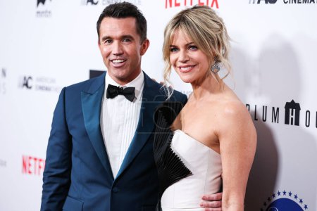 Photo for American actor Rob McElhenney and wife American actress Kaitlin Olson arrive at the 36th Annual American Cinematheque Awards Honoring Ryan Reynolds held at The Beverly Hilton Hotel on November 17, 2022 in Beverly Hills, Los Angeles, California, USA. - Royalty Free Image