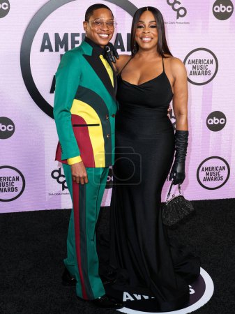 Photo for Jessica Betts and wife Niecy Nash Betts arrive at the 2022 American Music Awards (50th Annual American Music Awards) held at Microsoft Theater at L.A. Live on November 20, 2022 in Los Angeles, California, United States. - Royalty Free Image