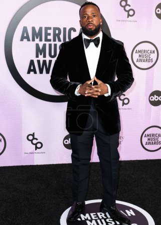 Photo for Yo Gotti (Mario Sentell Giden Mims) arrives at the 2022 American Music Awards (50th Annual American Music Awards) held at Microsoft Theater at L.A. Live on November 20, 2022 in Los Angeles, California, United States. - Royalty Free Image