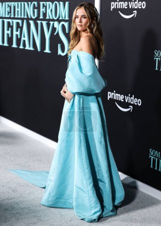 Photo for American actress Zoey Deutch wearing a Tiffany blue Carolina Herrera dress with Tiffany and Co. jewelry arrives at the Los Angeles Premiere Of Amazon Prime Video's 'Something From Tiffany's' held at AMC Century City 15 on November 29, 2022 in LA, CA - Royalty Free Image
