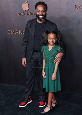 Photo for Greg McIntosh and Jordyn McIntosh arrive at the Los Angeles Premiere Of Apple Original Films' 'Emancipation' held at Regency Village Theatre on November 30, 2022 in Westwood, Los Angeles, California, United States. - Royalty Free Image