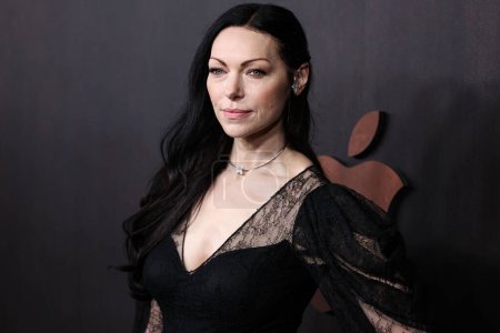 Photo for American actress Laura Prepon wearing a Pamella Rolland jumpsuit, Stuart Weitzman shoes and Pascale Bruni jewelry arrives at the Los Angeles Premiere Of Apple Original Films' 'Emancipation' held at Regency Village Theatre on November 30, 2022 - Royalty Free Image