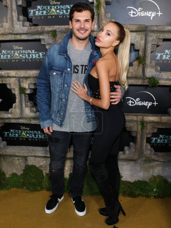 Photo for Gleb Savchenko and Elena Belle arrive at the Disney+ Original Series 'National Treasure: Edge Of History' Season 1 Red Carpet Event held at the El Capitan Theatre on December 5, 2022 in Hollywood, Los Angeles, California, United States. - Royalty Free Image