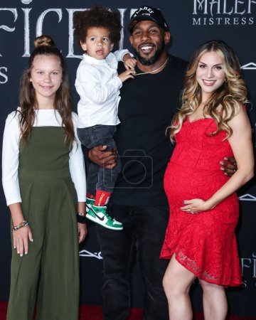 Photo for Stephen Laurel 'tWitch' Boss Dead At 40. HOLLYWOOD, LOS ANGELES, CALIFORNIA, USA - SEPTEMBER 30: Allison Holker, Weslie Fowler, Maddox Laurel Boss, father/American freestyle hip hop dancer, choreographer, actor and television producer Stephen Boss - Royalty Free Image