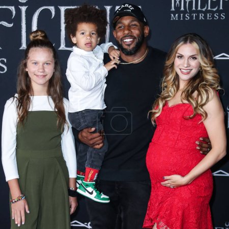 Photo for Stephen Laurel 'tWitch' Boss Dead At 40. HOLLYWOOD, LOS ANGELES, CALIFORNIA, USA - SEPTEMBER 30: Allison Holker, Weslie Fowler, Maddox Laurel Boss, father/American freestyle hip hop dancer, choreographer, actor Stephen Boss - Royalty Free Image