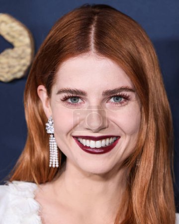 Photo for British-American actress Lucy Boynton wearing Chanel arrives at the Los Angeles Premiere Of Netflix's 'The Pale Blue Eye' held at the Directors Guild of America Theater Complex on December 14, 2022 in Los Angeles, California, United States. - Royalty Free Image