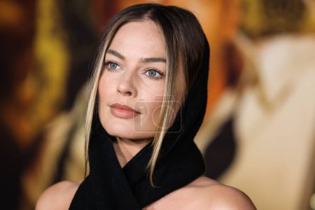 Photo for Australian actress Margot Robbie wearing an Alaia dress and Wolford tights arrives at the Global Premiere Screening Of Paramount Pictures 'Babylon' held at the Academy Museum of Motion Pictures on December 15, 2022 in Los Angeles, California, USA - Royalty Free Image