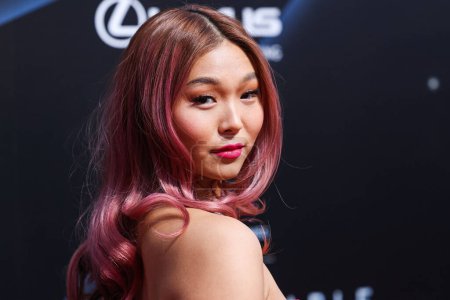 Photo for American snowboarder and two-time Olympic gold medalist Chloe Kim arrives at the 20th Annual Unforgettable Gala Asian American Awards presented by Character Media held at The Beverly Hilton Hotel on December 17, 2022 in Beverly Hills, Los Angeles - Royalty Free Image