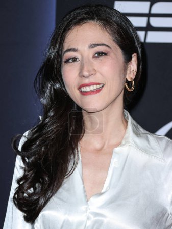 Foto de Mina Kimes arrives at ESPN And CFP's Allstate Party At The Playoff Event 2023 held at The Majestic Downtown on January 7, 2023 in Los Angeles, California, United States. - Imagen libre de derechos