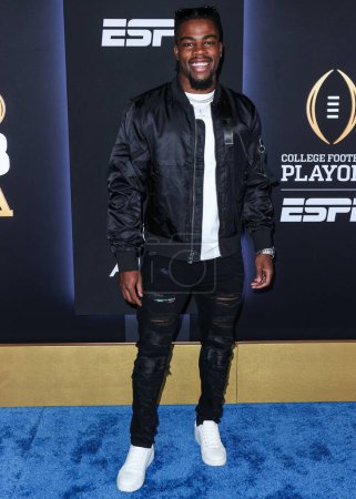 Foto de Obi Madi arrives at ESPN And CFP's Allstate Party At The Playoff Event 2023 held at The Majestic Downtown on January 7, 2023 in Los Angeles, California, United States. - Imagen libre de derechos