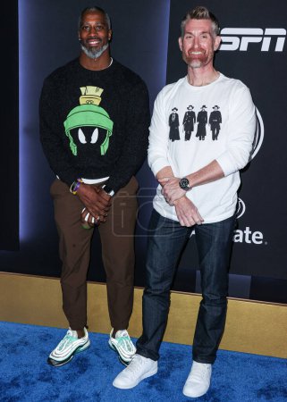 Photo for Roman Harper and Marty Smith arrive at ESPN And CFP's Allstate Party At The Playoff Event 2023 held at The Majestic Downtown on January 7, 2023 in Los Angeles, California, United States. - Royalty Free Image